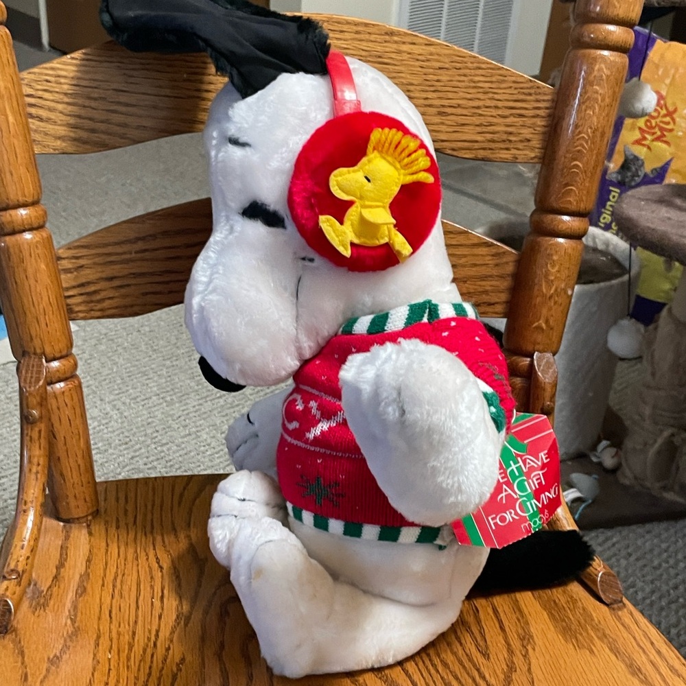 Macy’s vintage Snoopy Plush with red Christmas Sweater. He is about 21” tall.